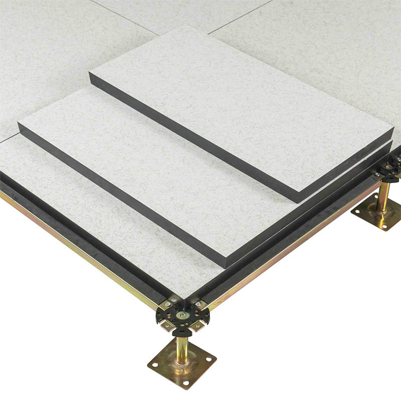 How do anti-static wood core raised floors help prevent electrostatic discharge damage to sensitive electronic equipment?